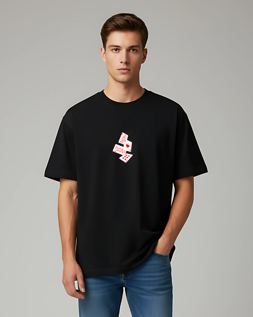 Man wearing a black t-shirt with a graphic design on a gray background