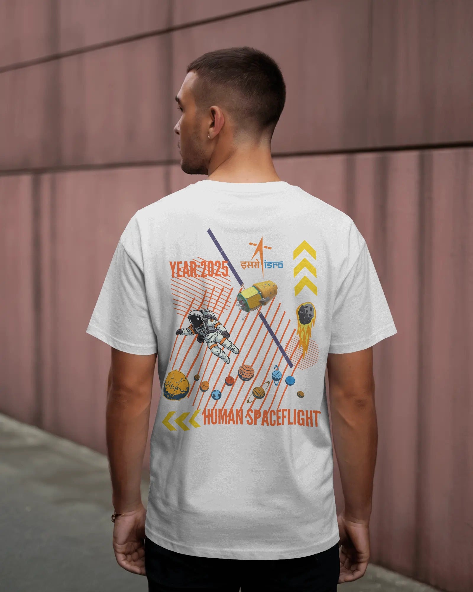 Man wearing a white t-shirt with a space-themed design on the back, standing against a plain wall.

Premium Quality Oversized t-shirt | 100% cotton | Biowash | White Color | Black Color
 
Gaganyaan ISRO White oversized astronaut t-shirt by ESROVERSE – includes free shipping